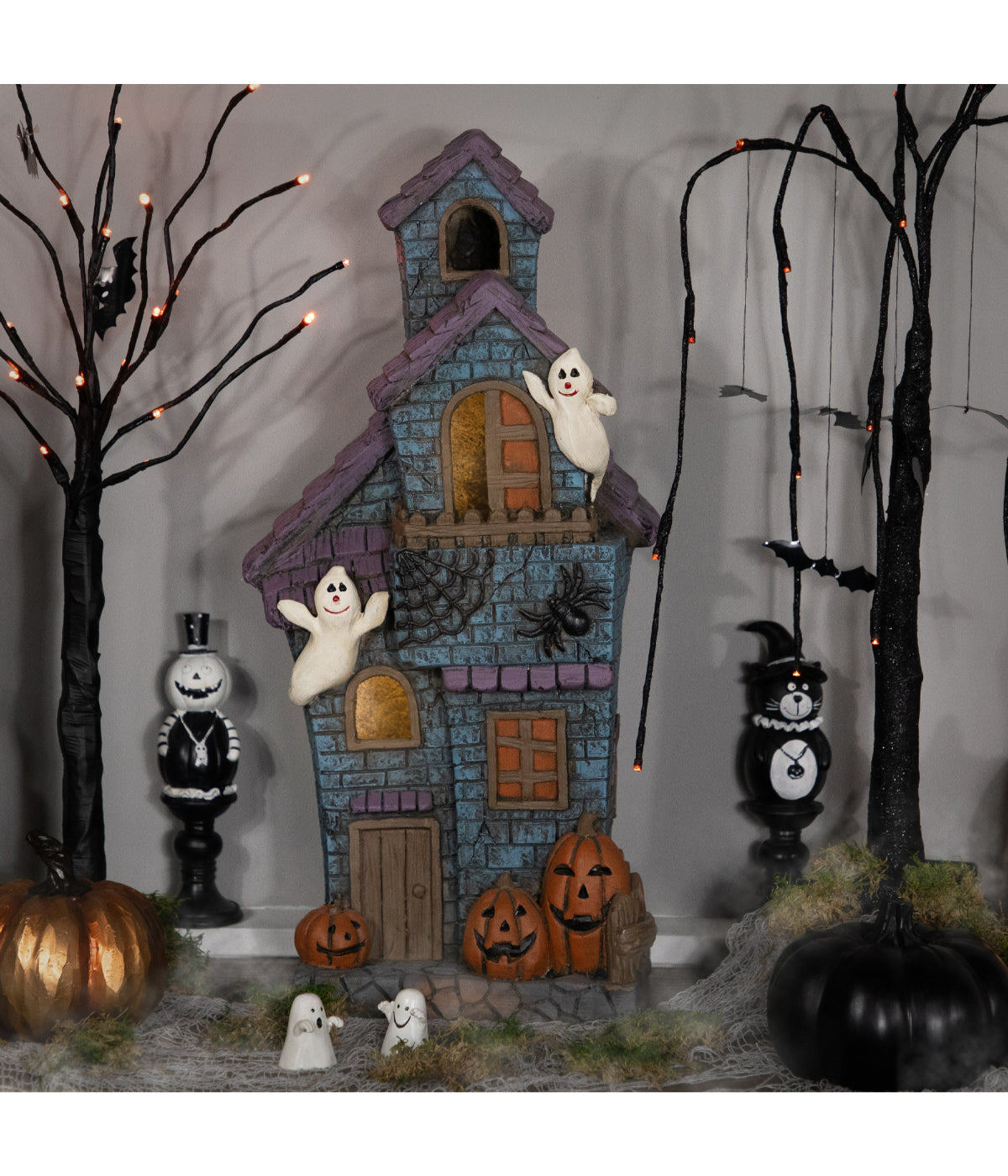 Lighted Haunted House with Ghosts Halloween Decoration